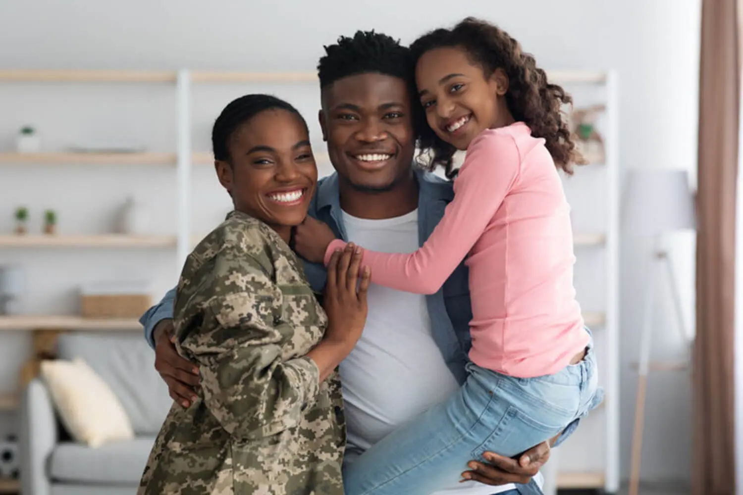 Military service member with family at home planning their next home purchase